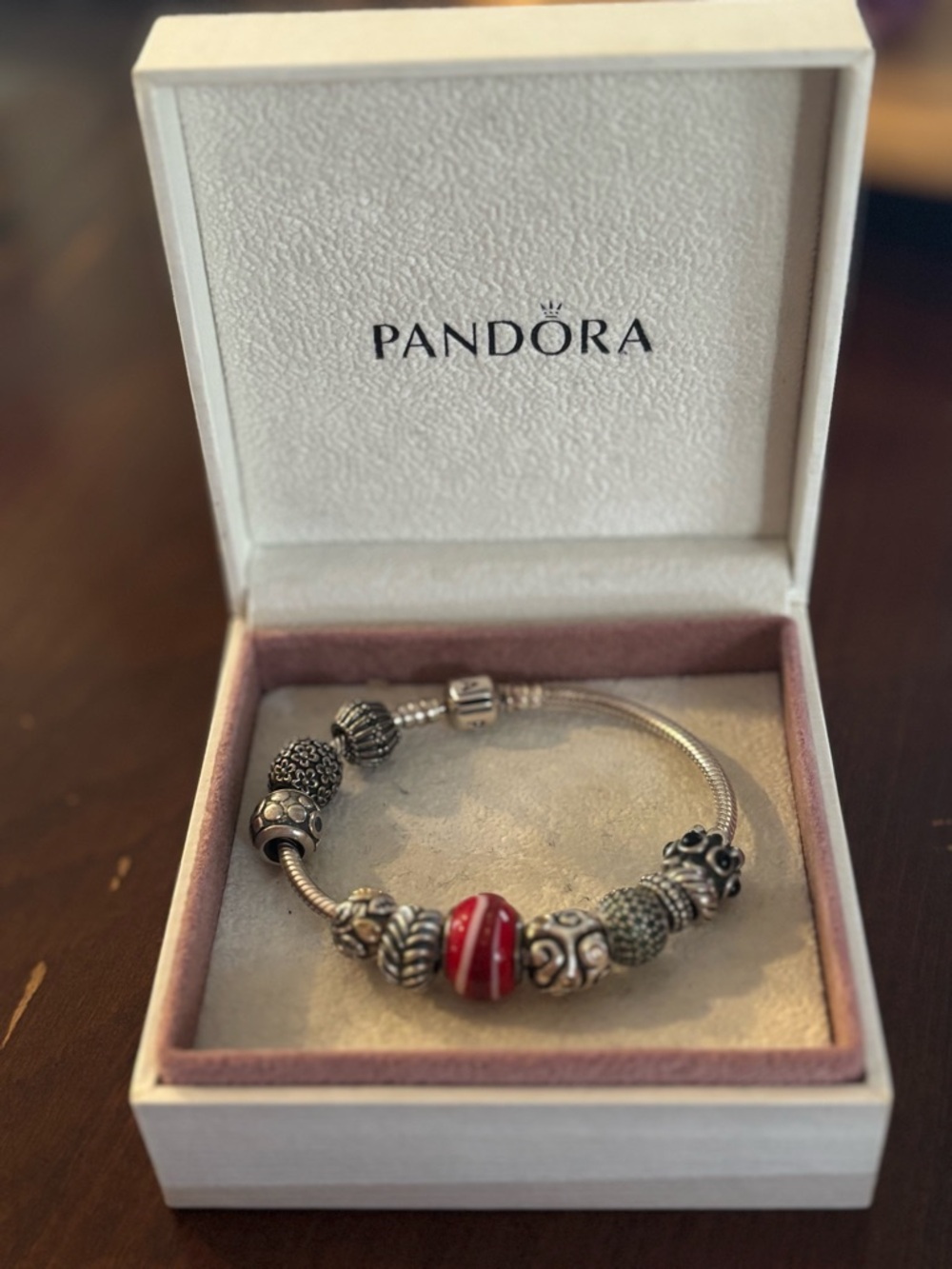 Pandora bracelet with many retired charms